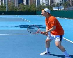He loves to play tennis whenever he gets free time.